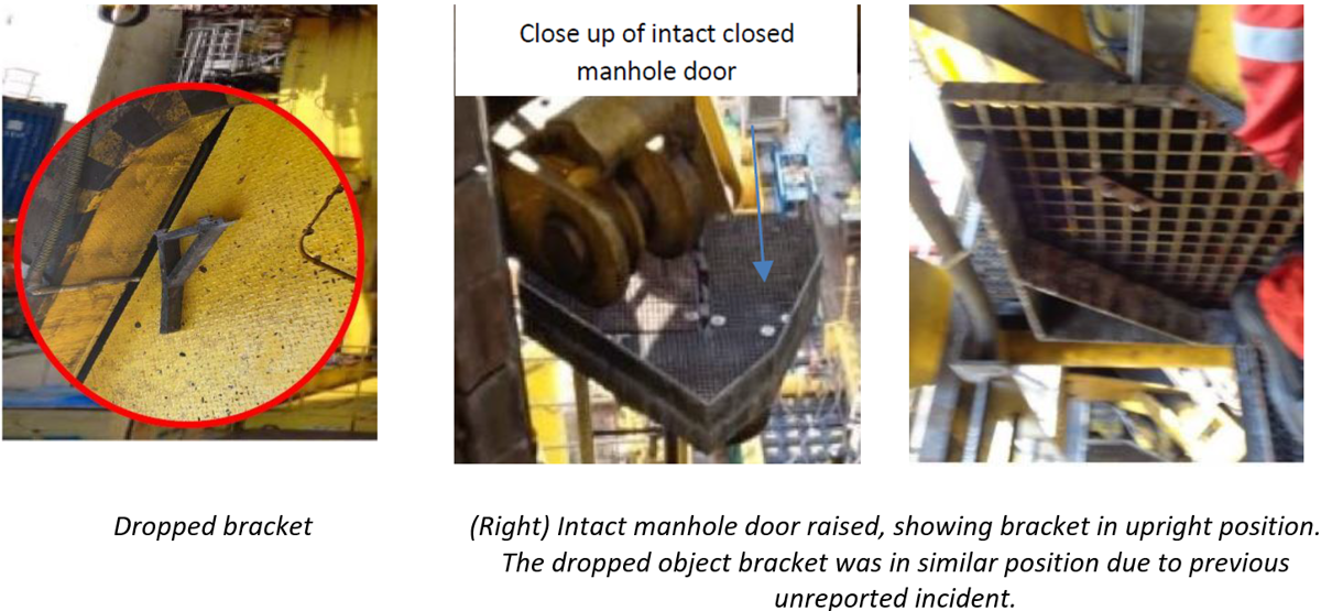 Dropped bracket and intact manhole door raised, showing bracket in upright position
