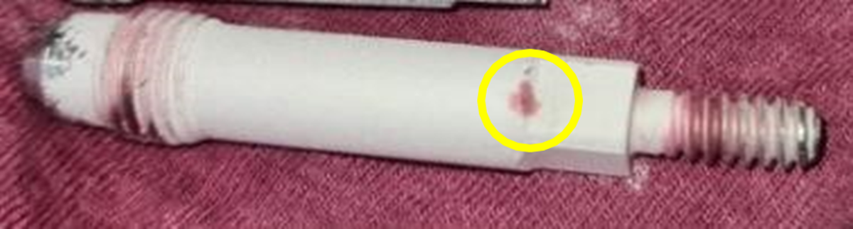 IMCA SF Failure of EGS valve stem on dive helmet Picture 1 Valve stem with stress-like indications in the material