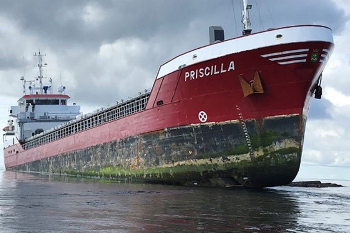 Vessel ran aground after Officer of the Watch failed to effectively monitor the ship's progress for about two hours