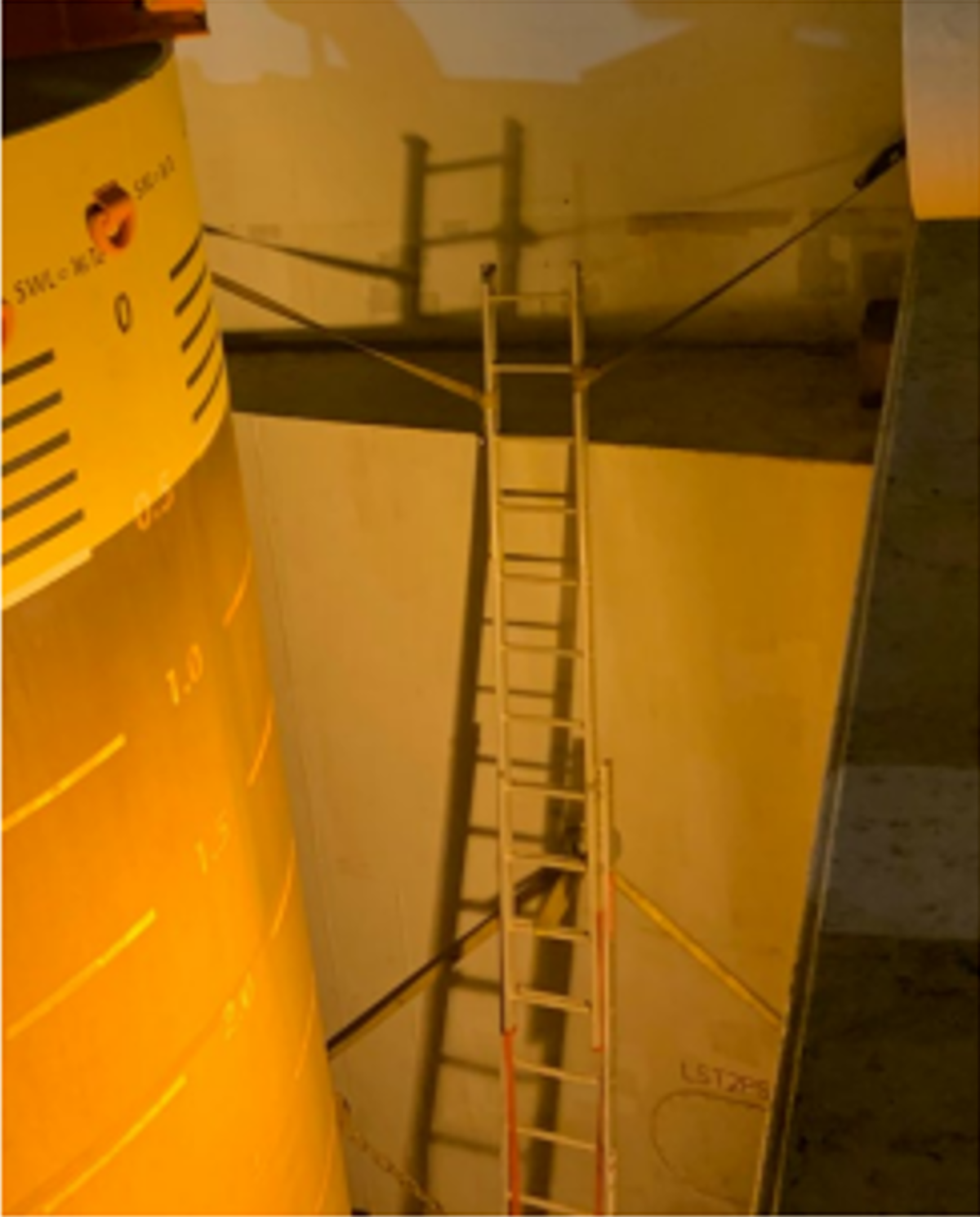 A crew person suffered a fractured pelvis falling 4-5 metres from a  temporary access ladder onboard a cargo vessel. The ladder was  installed at a previous equipment mobilisation following realisation  that the permanent access / egress hatches to the cargo hold had  been blocked.