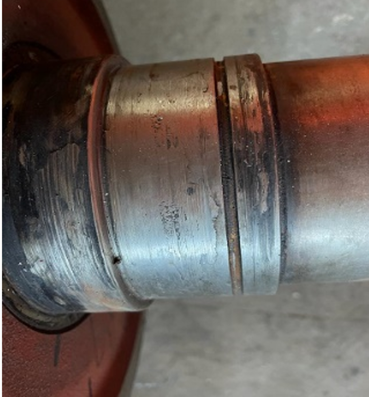 Rotor of shaft generator / failed bearing part caused overheating and smoke The temperature sensor installed in the Starboard Shaft Generator was providing inconsistent readings since the most recent overhaul; this had not been reported by the engine crew