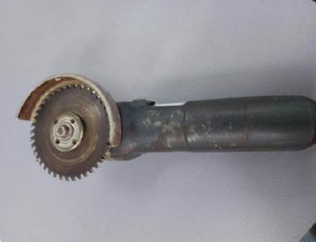 Operator cut both hands when mishandling grinder after maintenance work