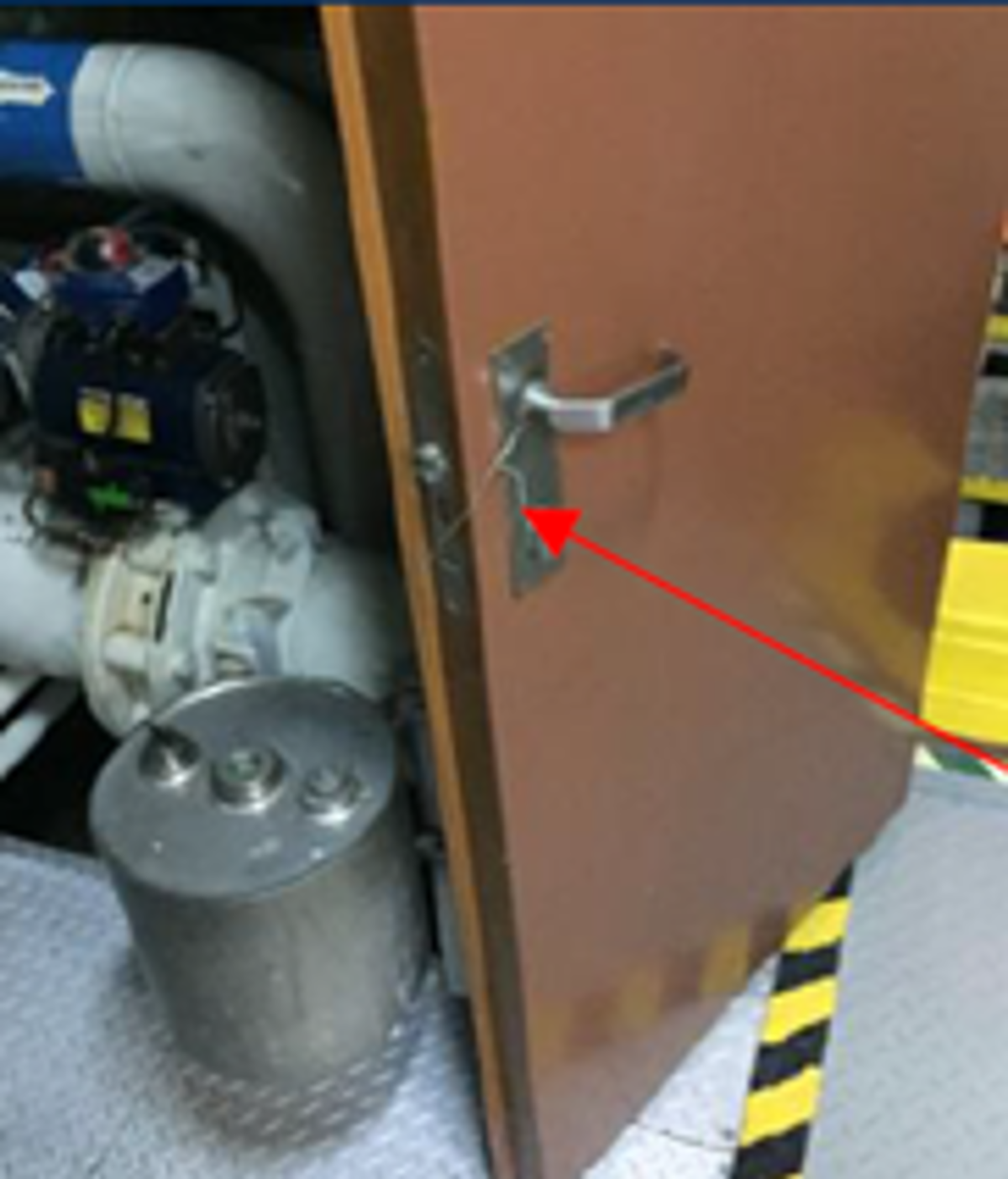 Fire door in Engine Room was kept open by a piece of wire