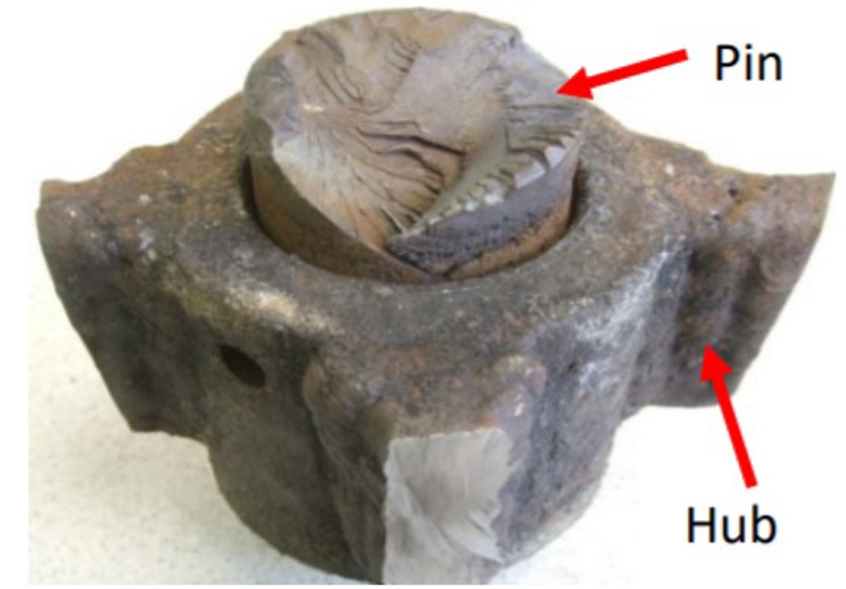Accommodation ladder connection pin with severe corrosion over the pin’s fracture surface & sidewall and on the surface of the hub.