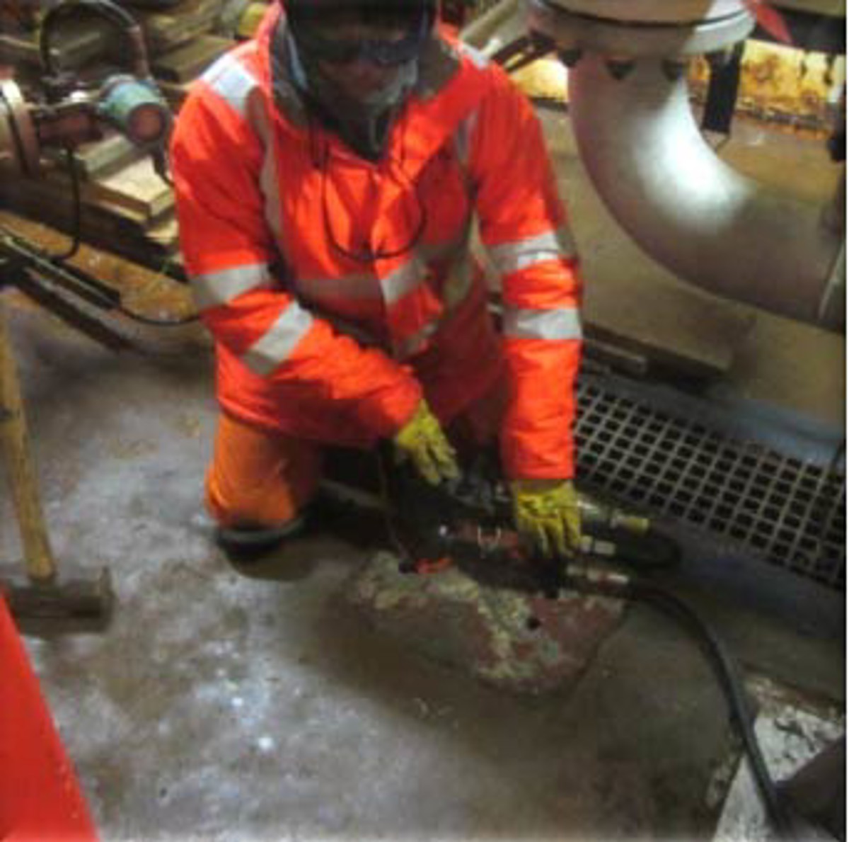 Near-miss: Drawstring on storm jacket nearly drawn into rotating equipment