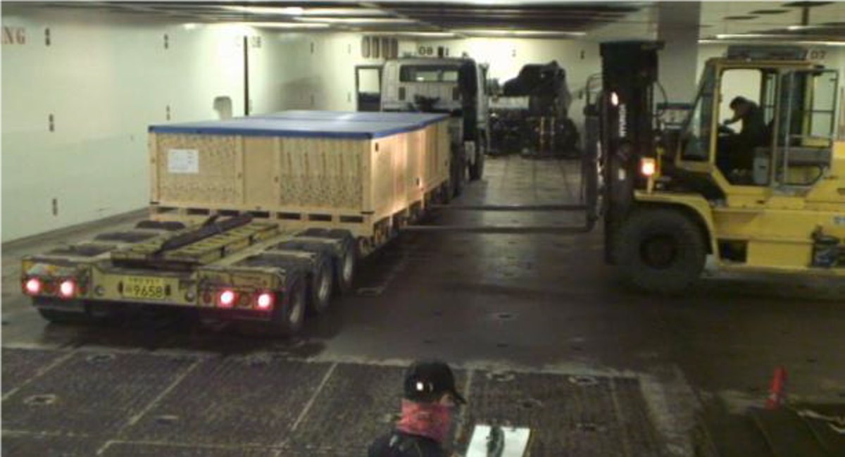 Boxes being unloaded by fork lift