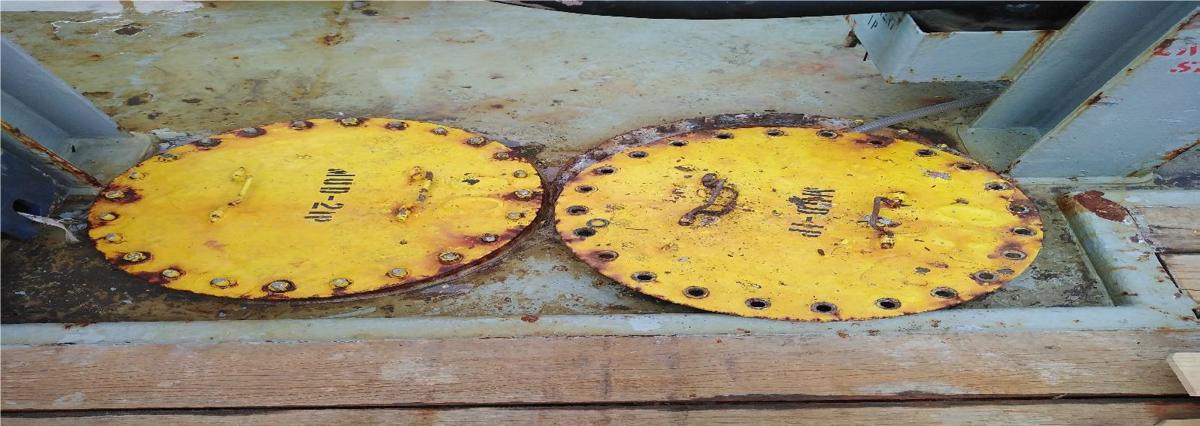 During a safety round on deck prior to cargo operations it was noticed that a manhole had been opened in order to pump out ballast water to replace a faulty valve.