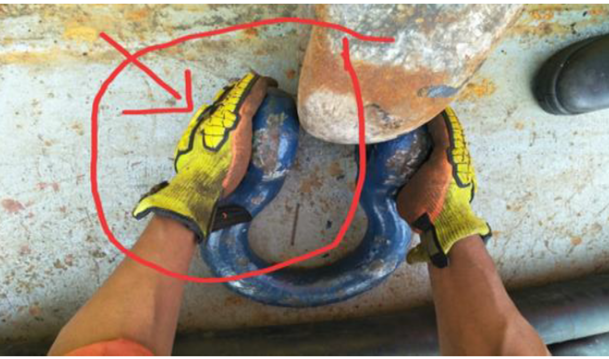 During a pennant wire spooling operation, the injured person was trying to  remove a 35 tonne SWL shackle from the pennant eye. While trying to jiggle  the shackle, it landed on his left middle finger causing a crush injury 1.5cm  long.