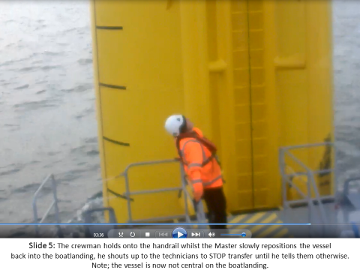 The crewman holds onto the handrail whilst the Master slowly repositions the vessel