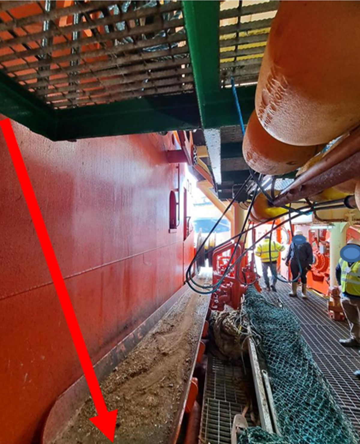 Main deck showing chute where IP landed from the grating above (height of approximately 2m). Red arrow depicts the drop zone and area where IP landed. Main deck showing chute where IP landed from the grating above (height of approximately 2m). Red arrow depicts the drop zone and area where IP landed.