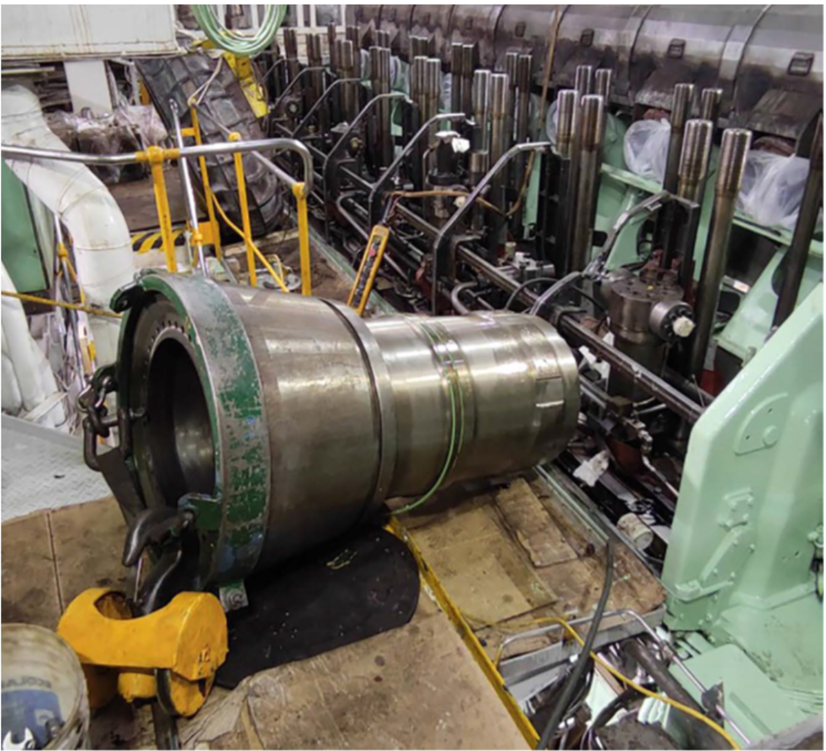 Engineers were overhauling a large diesel generator, using the engine room’s  overhead gantry crane to lift a 1200kg cylinder liner into position above the engine. This required the electric winch  motor to raise the crane hook to its maximum lift height, at which point the crane’s hoisting wire suddenly parted.  The suspended cylinder liner fell onto the engine, causing damage to both pieces of equipment, and struck the left  foot of an engine room fitter who was standing nearby.