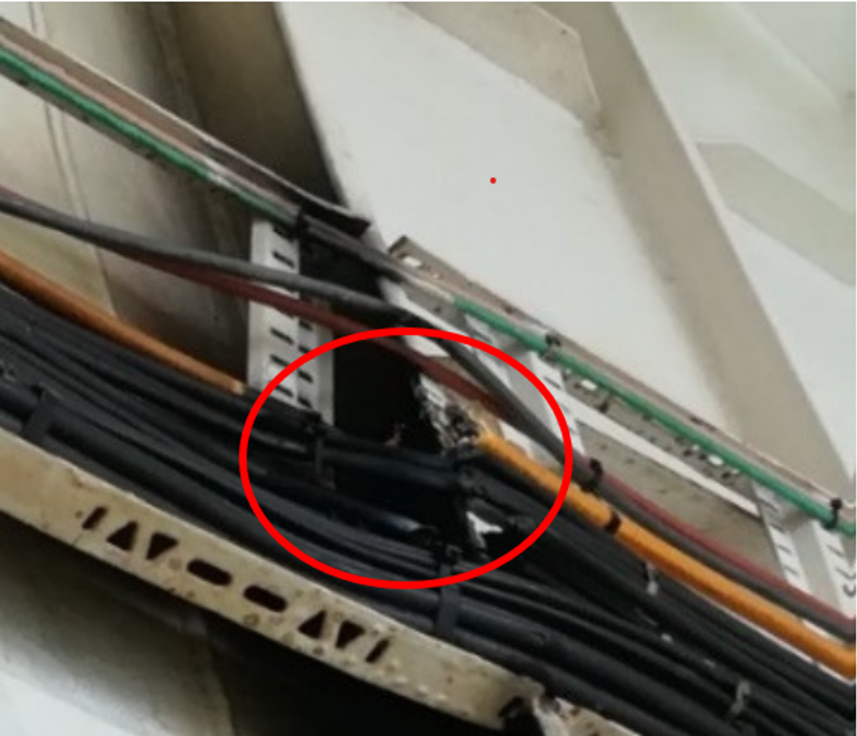 The electrical cables and hydraulic hoses serving the equipment had been severed