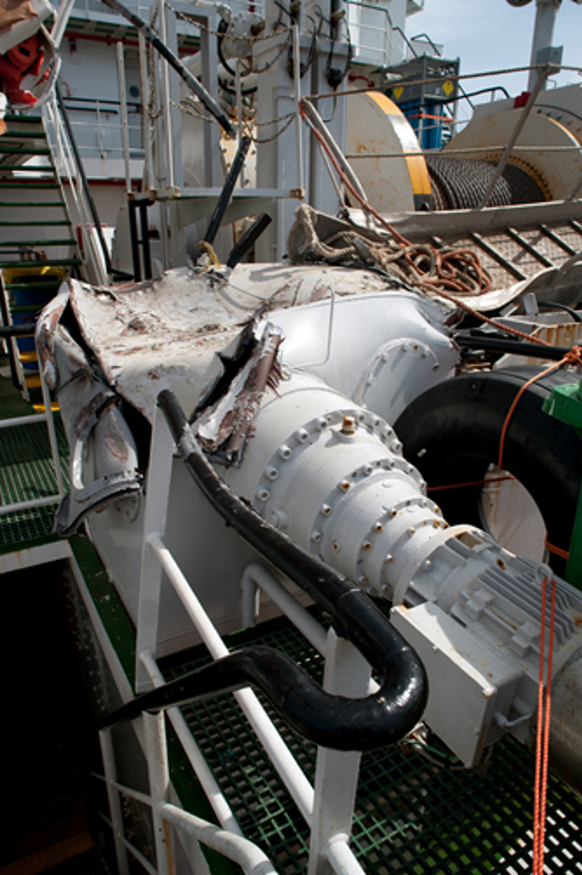 During the tow of a structure to location, a fire occurred in the engine room of the tow tug. This led to a blackout resulting in a collision with the structure on the transport barge.