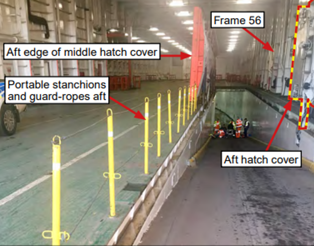 The crewman was working alone and preparing to paint the leading edge of the open ramp hatch cover. 