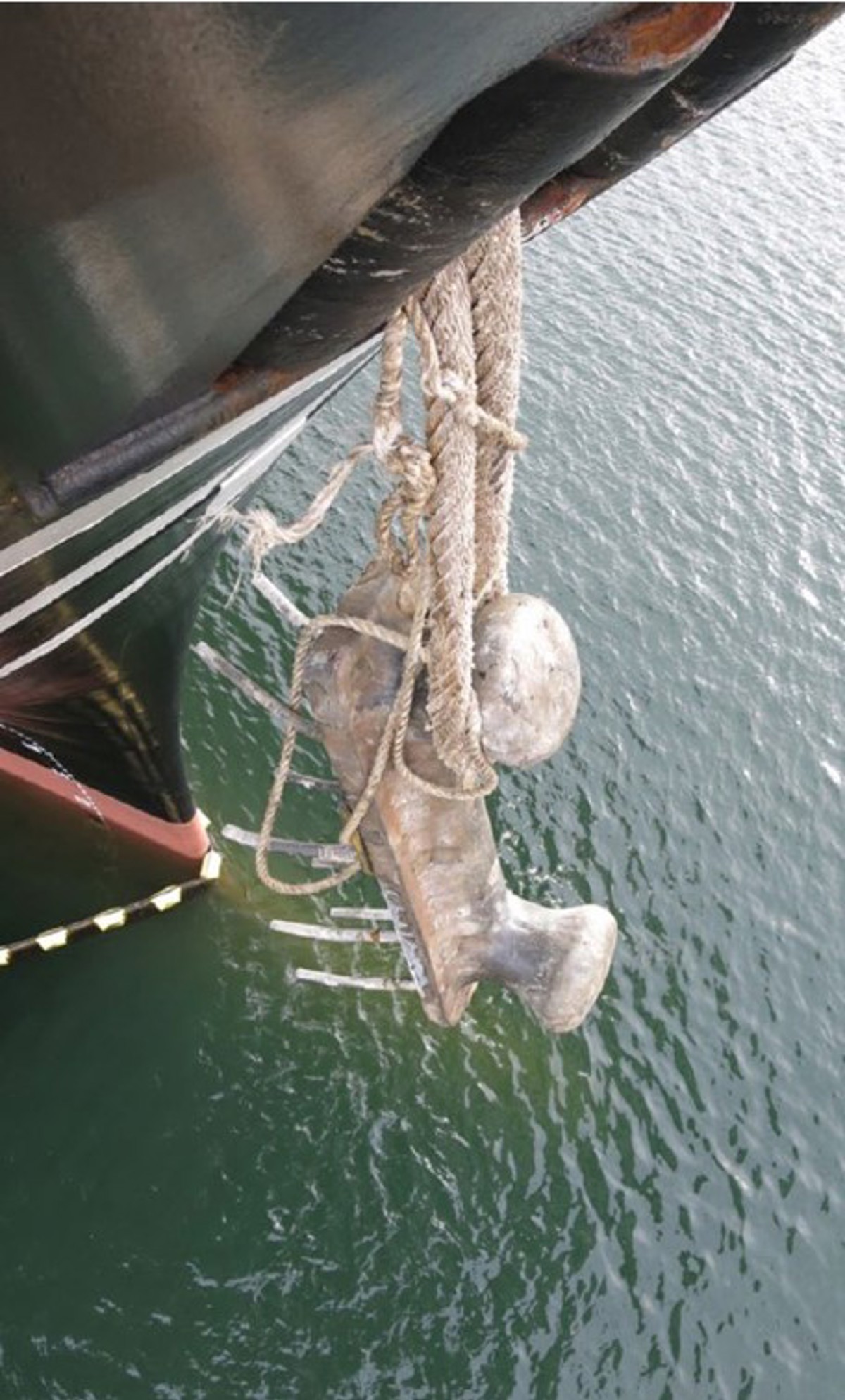 Photo of bollard ripped from the ground by a vessel