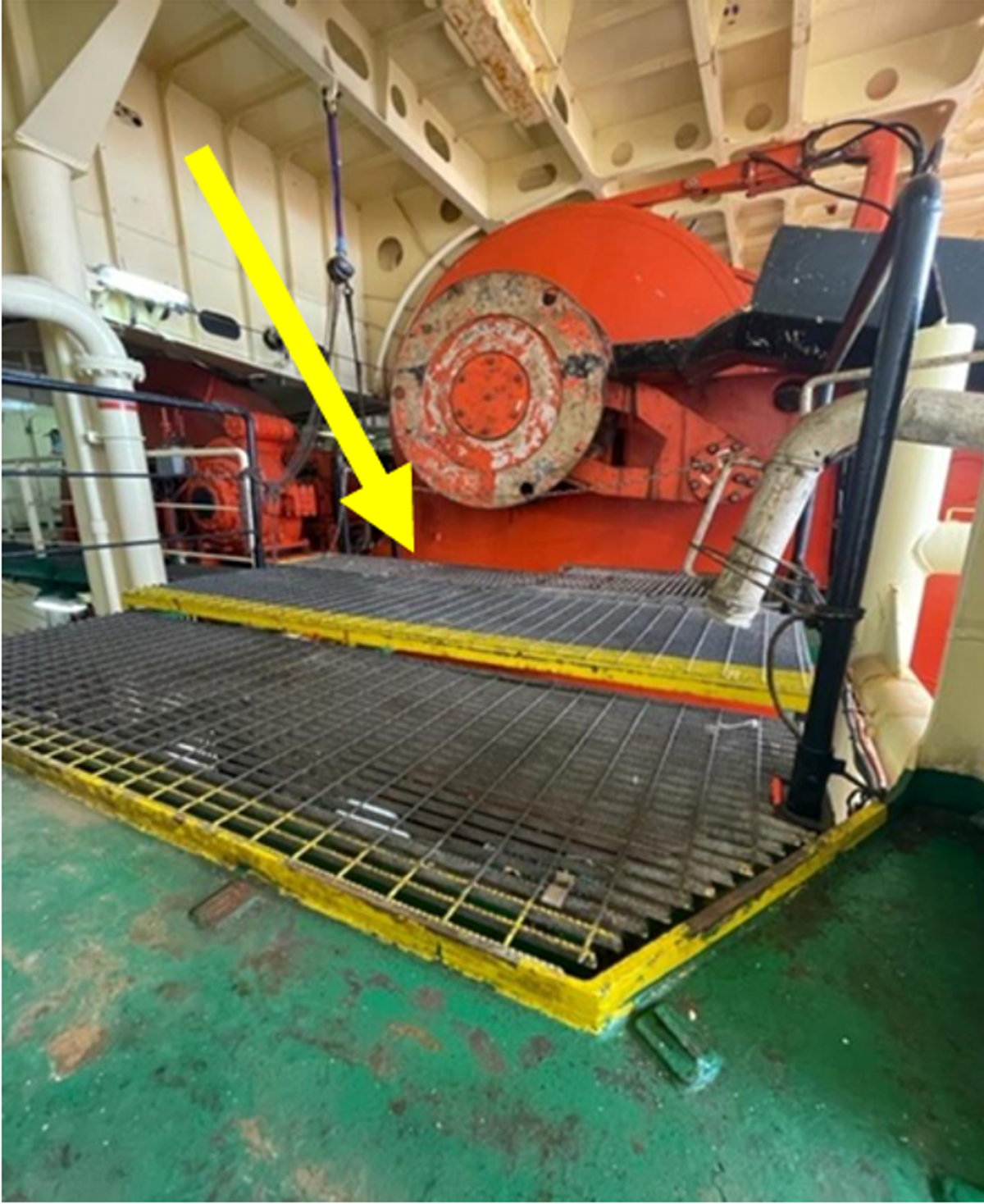 ‘A’ deck showing the area around the gypsy and grating walkway including different levels highlighted by yellow paint. The yellow arrow denotes the space in which the IP fell between winch gypsy and grating. ‘A’ deck showing the area around the gypsy and grating walkway including different levels highlighted by yellow paint. The yellow arrow denotes the space in which the IP fell between winch gypsy and grating.