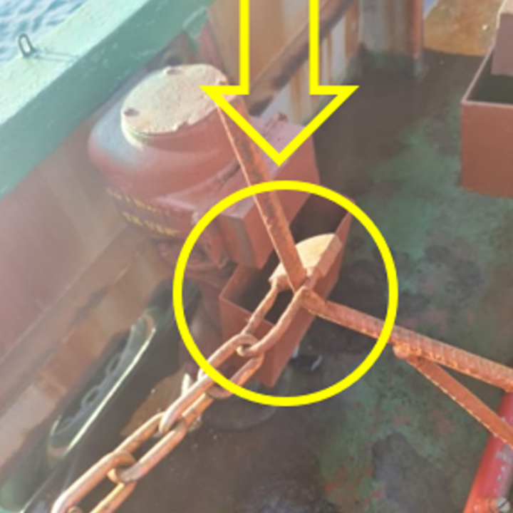 A crew person was checking the water tightness of the engine room’s emergency hatch cover. Safety lock pins, used to prevent the hatch cover from closing, were missing. To hold the hatch cover from closing, the crew person improvised using a nearby chain which he hooked to a hose support. H A crew person was checking the water tightness of the engine room’s emergency hatch cover. Safety lock pins, used to prevent the hatch cover from closing, were missing. To hold the hatch cover from closing, the crew person improvised using a nearby chain which he hooked to a hose support. H