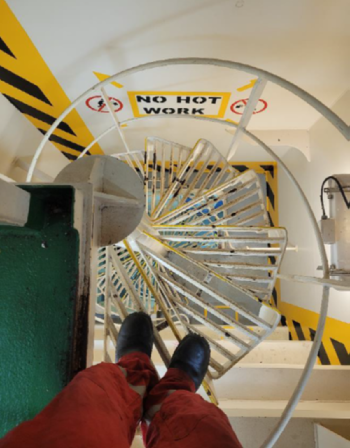 Spiral ladder which would not have allowed passage of a stretcher Spiral ladder which would not have allowed passage of a stretcher