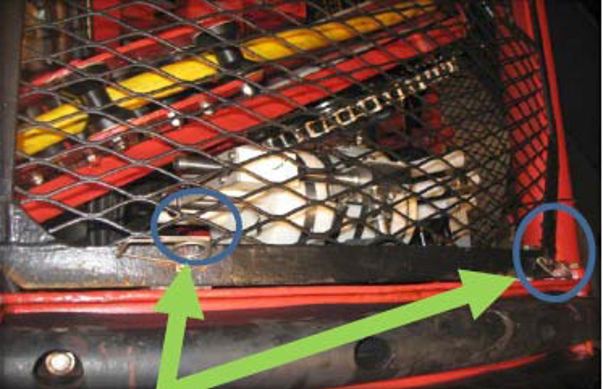 Bottom of TMS protection gate showing fixing brackets with bolts and ‘R’ clips which remained secured
