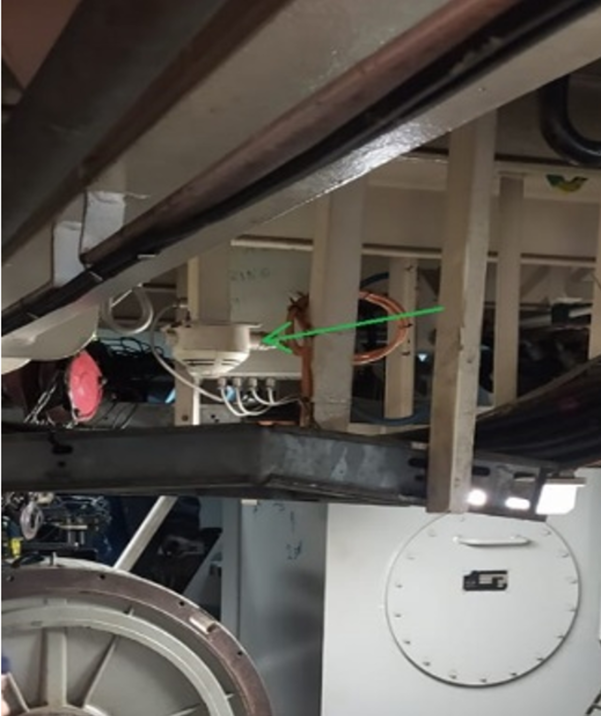 Smoke detector over the affected shaft generator The temperature sensor installed in the Starboard Shaft Generator was providing inconsistent readings since the most recent overhaul; this had not been reported by the engine crew